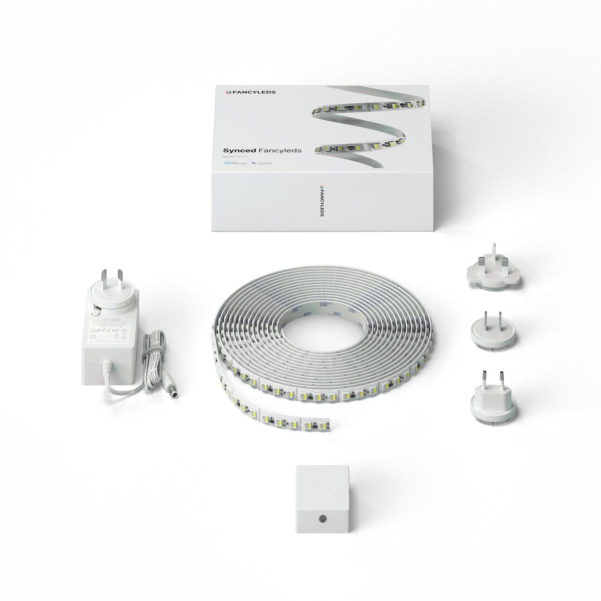 Everything included in the Synced Fancyleds kit: control box, RGBW LED strip and universal power adaptor