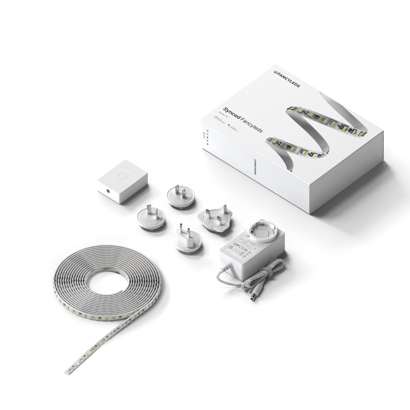 Everything included in the Synced Fancyleds kit: control box, RGBW LED strip and universal power adaptor